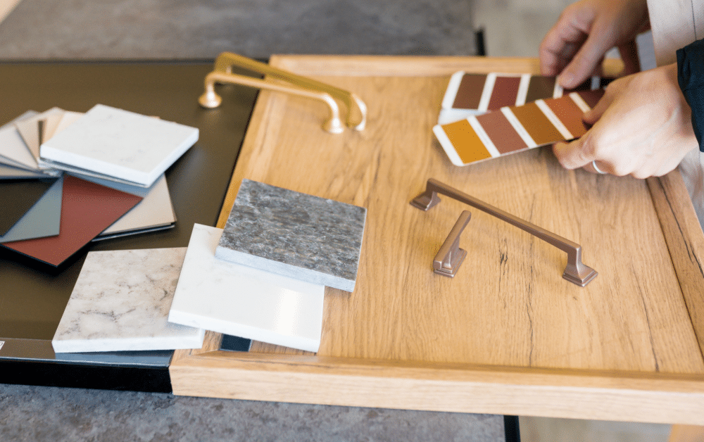 table covered with selection of australian kitchen renovation materials