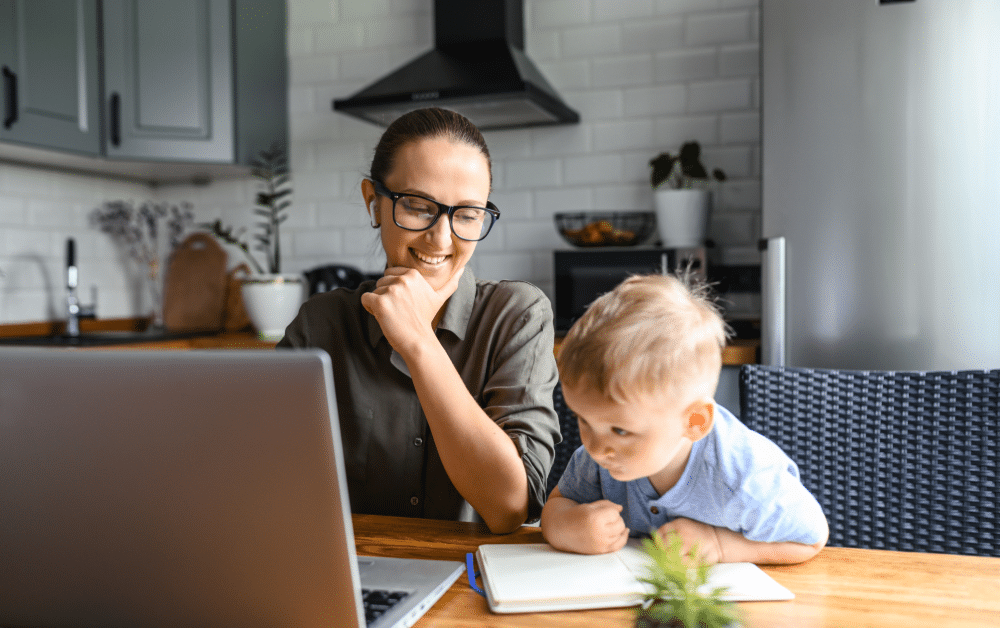 woman working on laptop from her australian kitchen